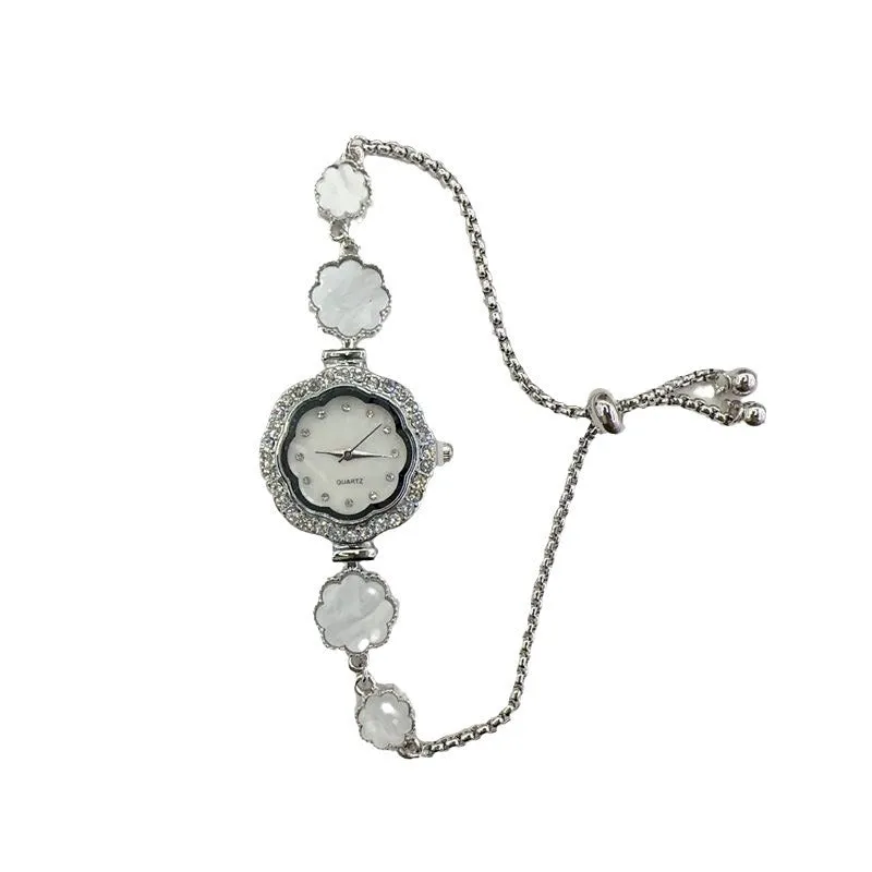 Light luxury, niche temperament, diamond-encrusted flower-shaped drawstring bracelet watch
